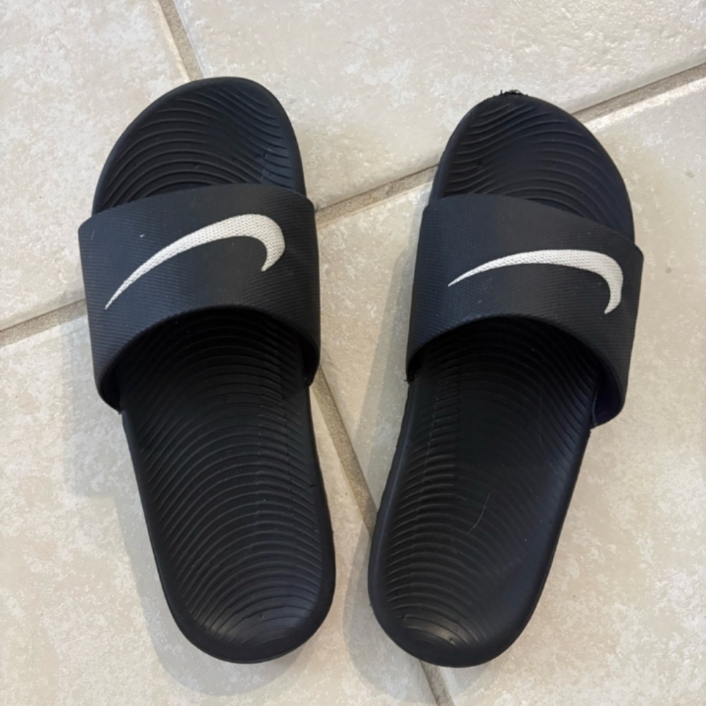 Nike Black Slide Sandals with White Swoosh Accent size 1c